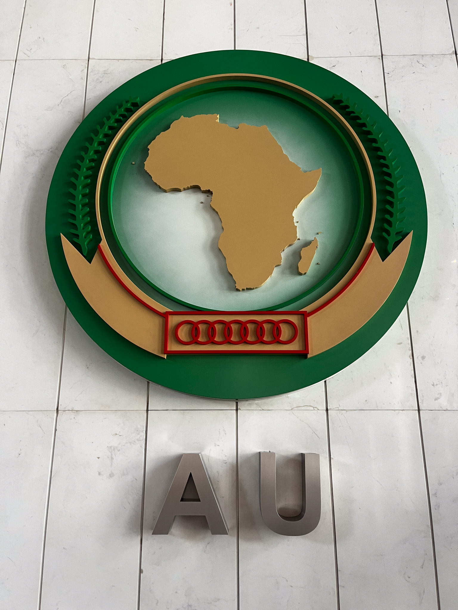AU