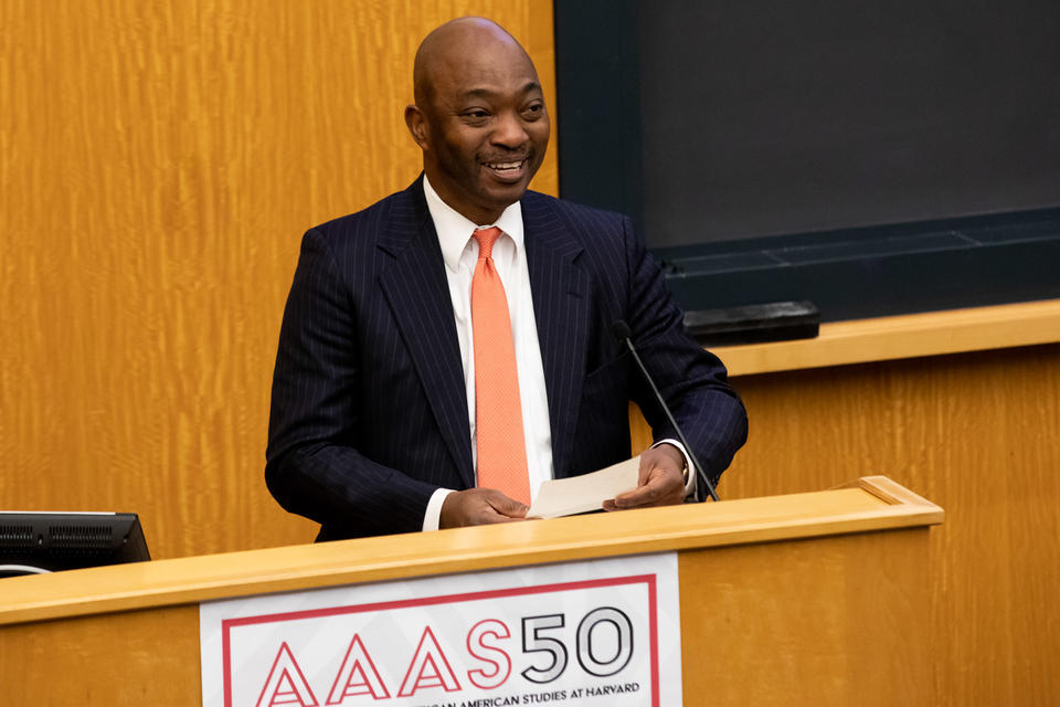 Professor Akyeampong Speaking at a Lectern