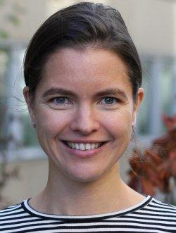 A professional headshot of Amanda