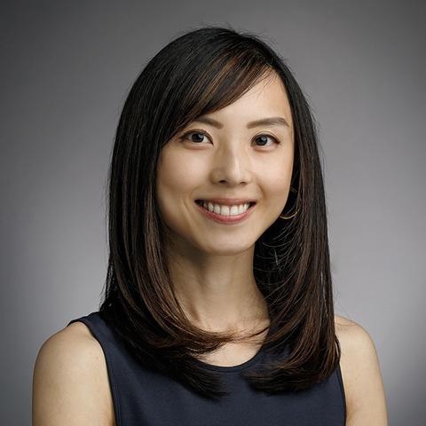 A professional headshot of Vivien